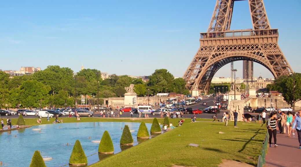 Eiffel Tower showing heritage elements, a monument and a park