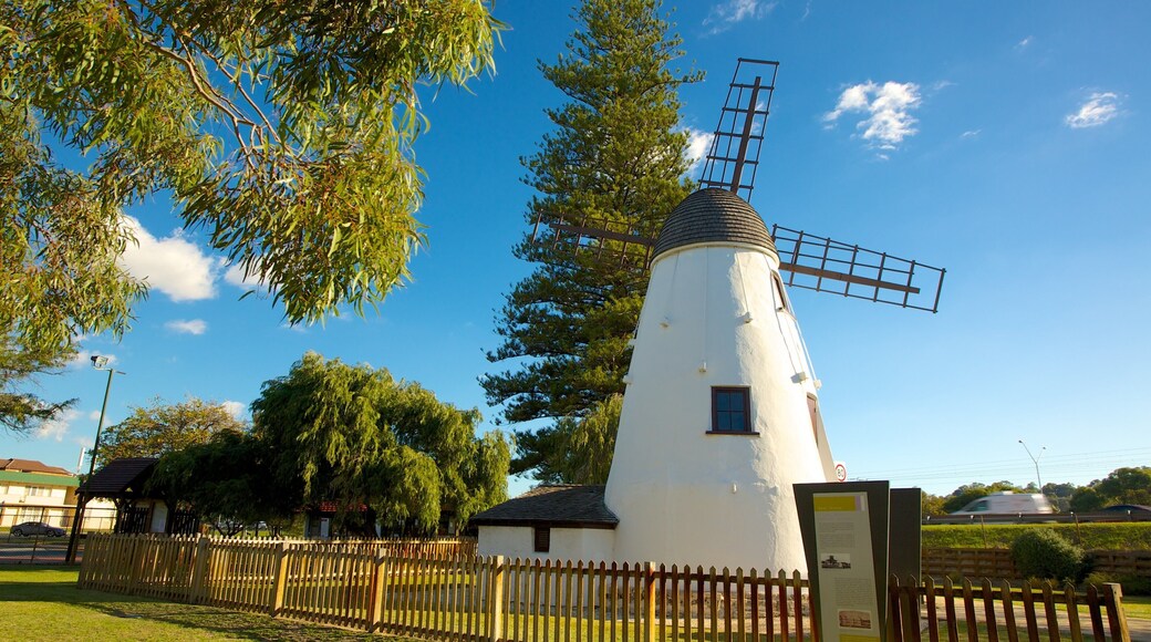 Old Mill showing heritage architecture and a windmill