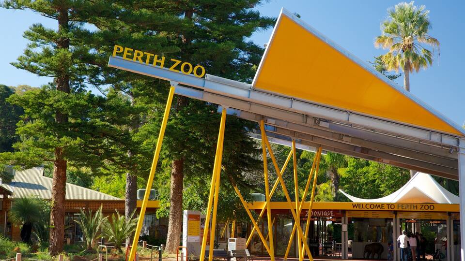 The entrance to the Perth Zoo with a prominent yellow and white sign.