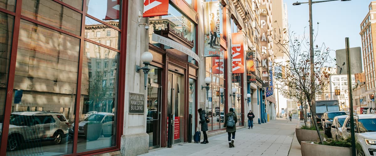Pennsylvania Academy of the Fine Arts showing street scenes and a city