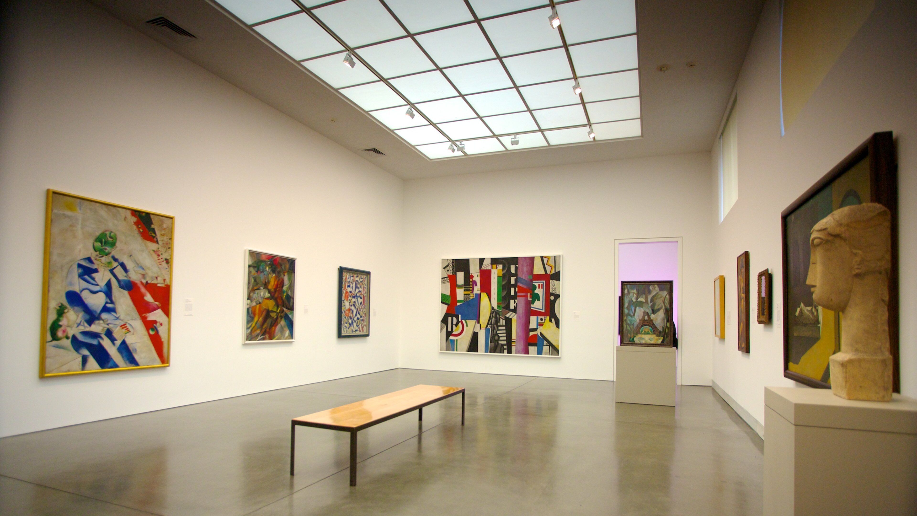 Art pieces displayed in the contemporary gallery of the Philadelphia Museum of Art showcasing diverse styles and vibrant colors