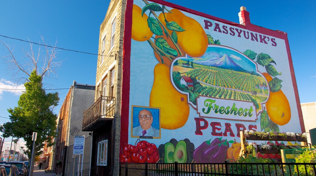 Italian Market que incluye señalización, arte y mercados