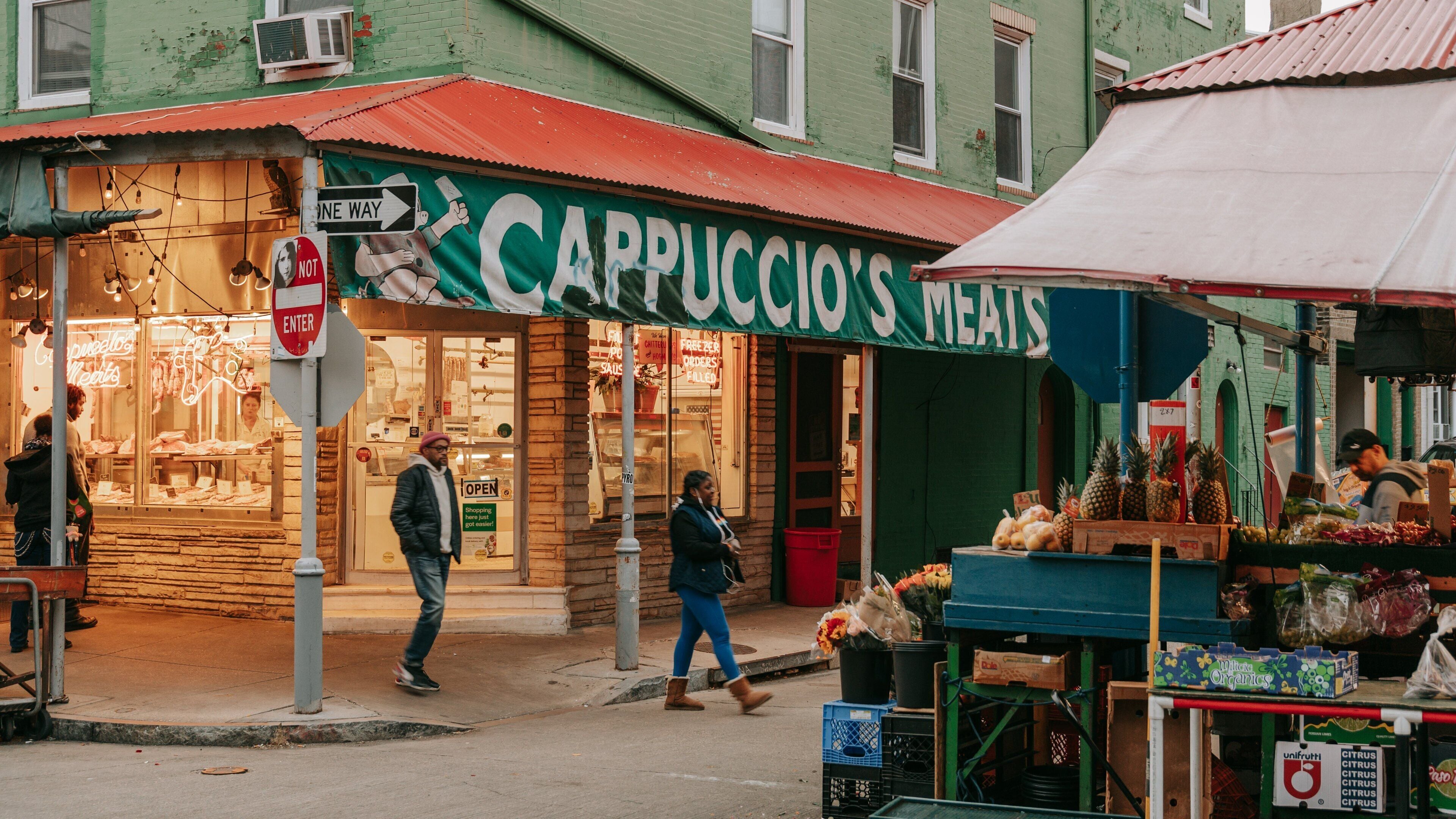 Italian Market which includes markets, street scenes and signage