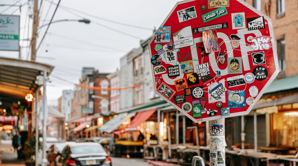 Italian Market featuring outdoor art and signage