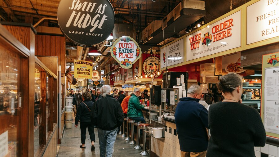 Reading Terminal Market featuring interior views, signage and markets
