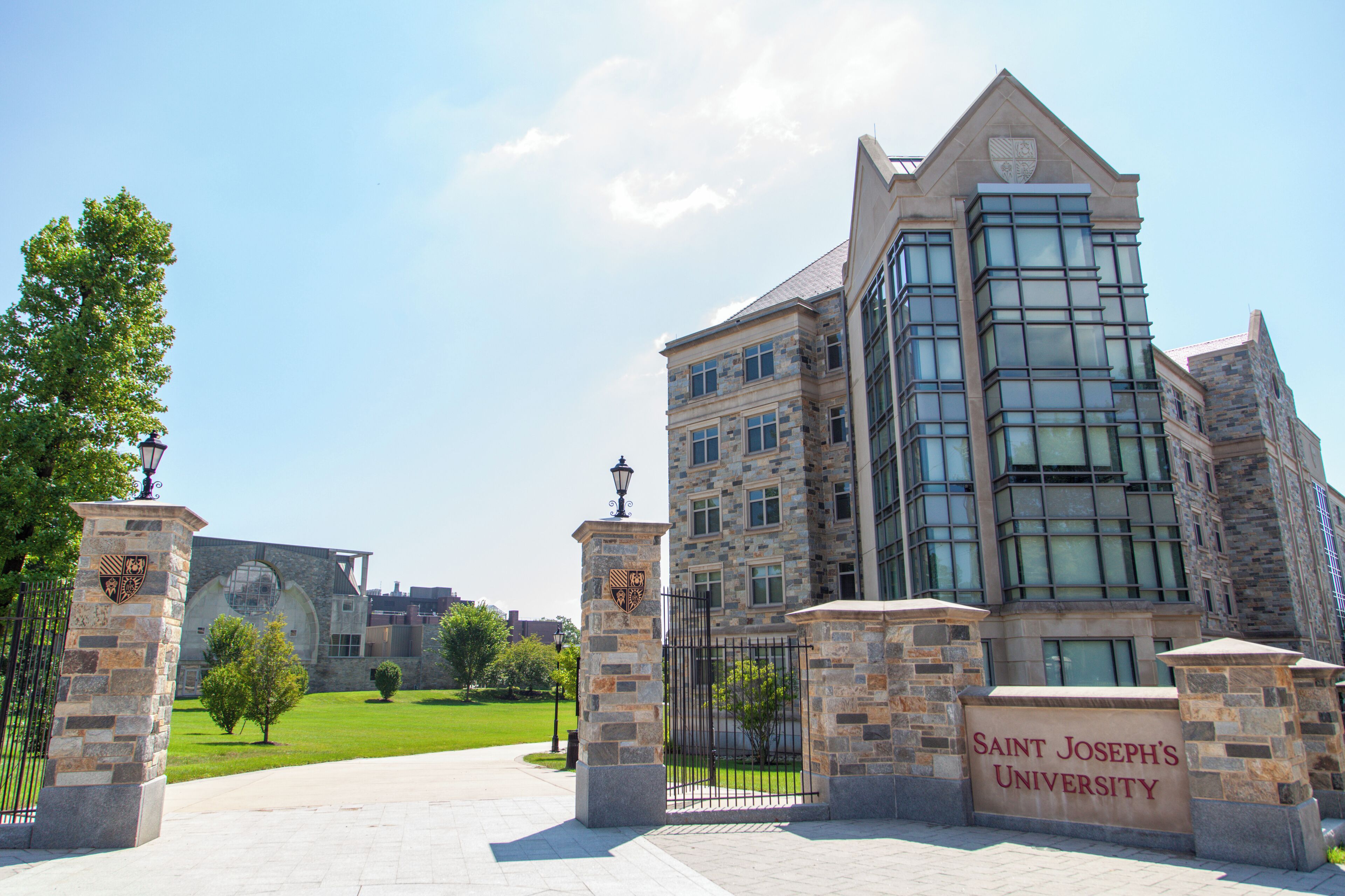 Saint Joseph's University building with stone architecture and a clear blue sky.
