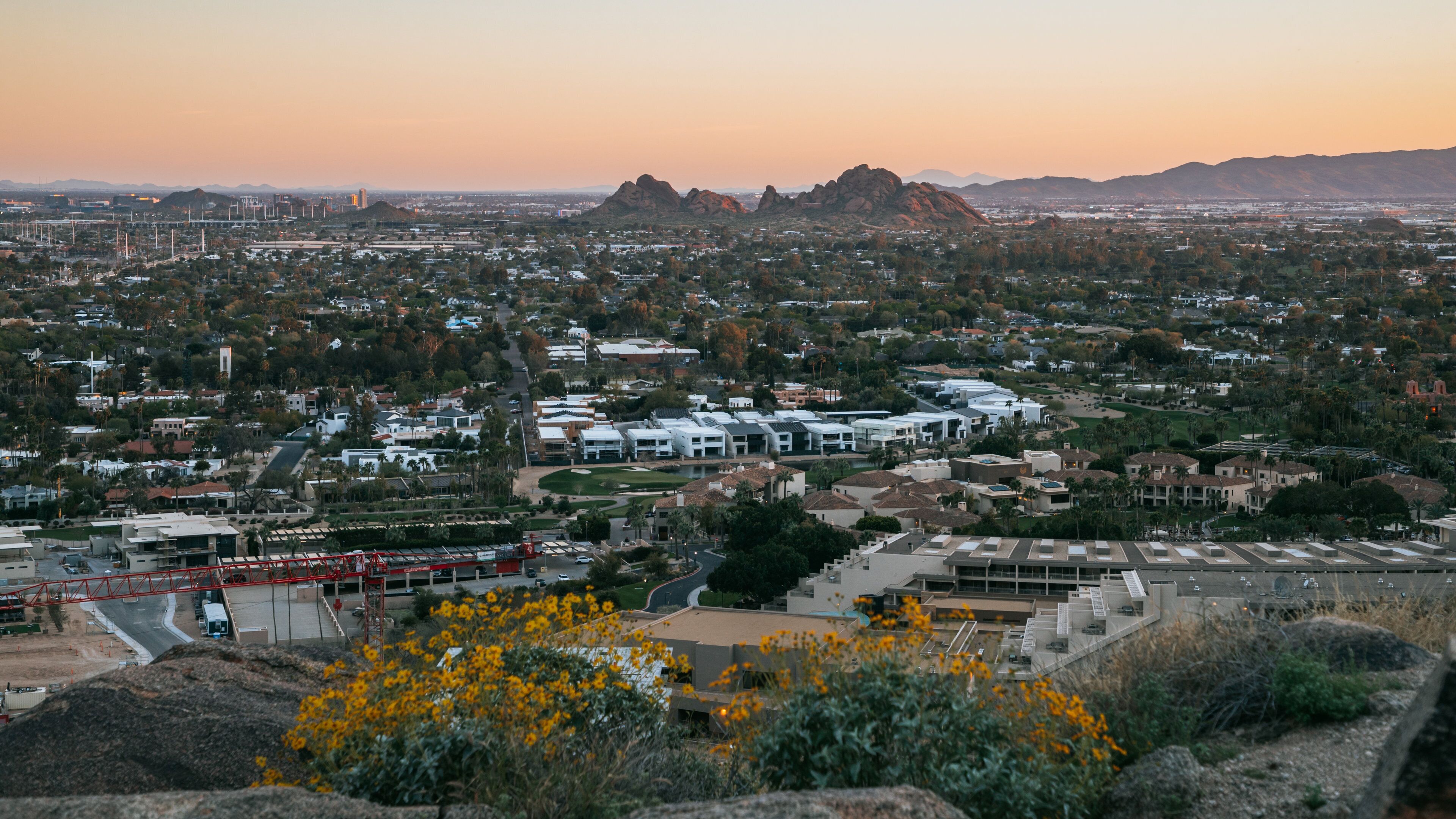 Camelback Mountain which includes landscape views and a sunset