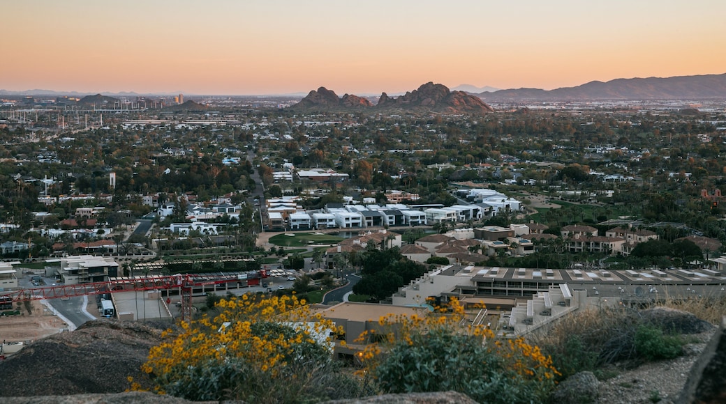 Camelback Mountain which includes landscape views and a sunset