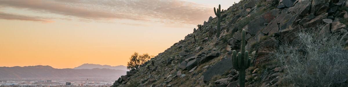 Camelback Mountain showing a sunset, desert views and landscape views