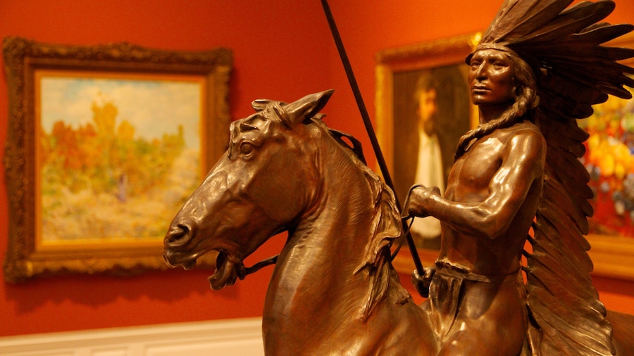 Portland Art Museum featuring art, interior views and a statue or sculpture