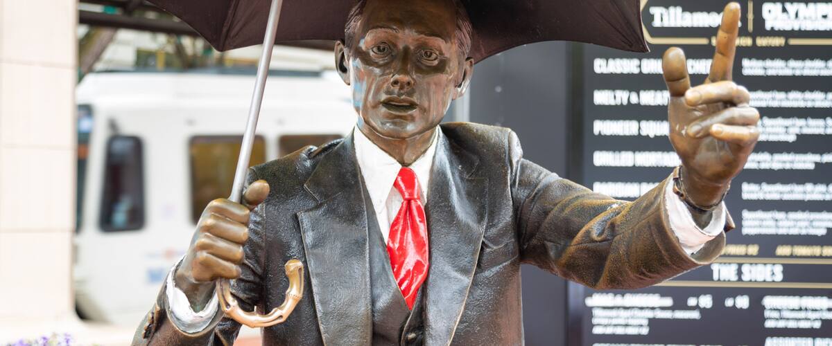 Pioneer Courthouse Square showing a statue or sculpture and outdoor art