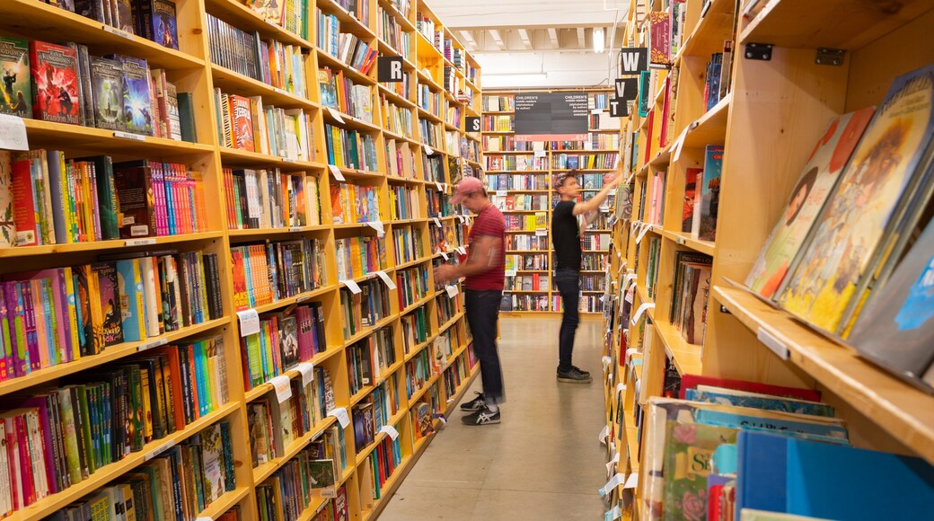 Powell\'s City of Books showing interior views as well as an individual male