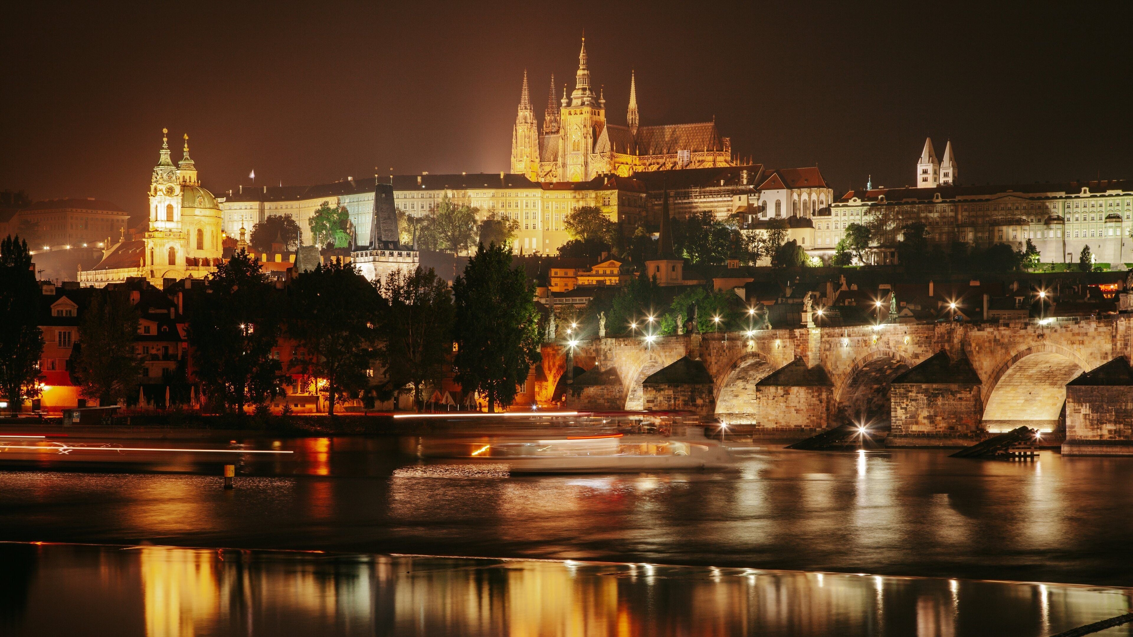 Prague Castle which includes night scenes and a city