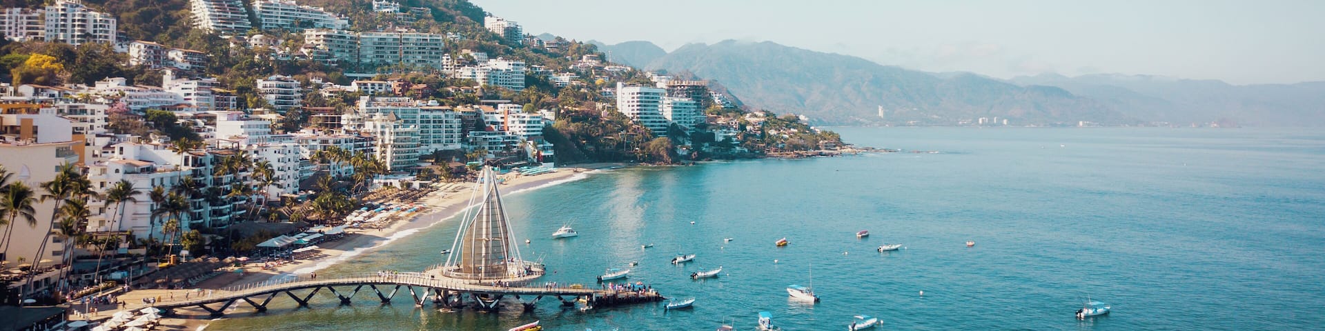 Mexico, Jalisco, Aerial view of Playa Los Muertos, beach and pier in Puerto Vallarta