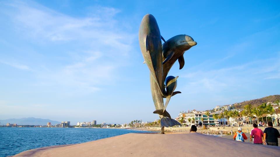 Malecon featuring general coastal views, a coastal town and a statue or sculpture