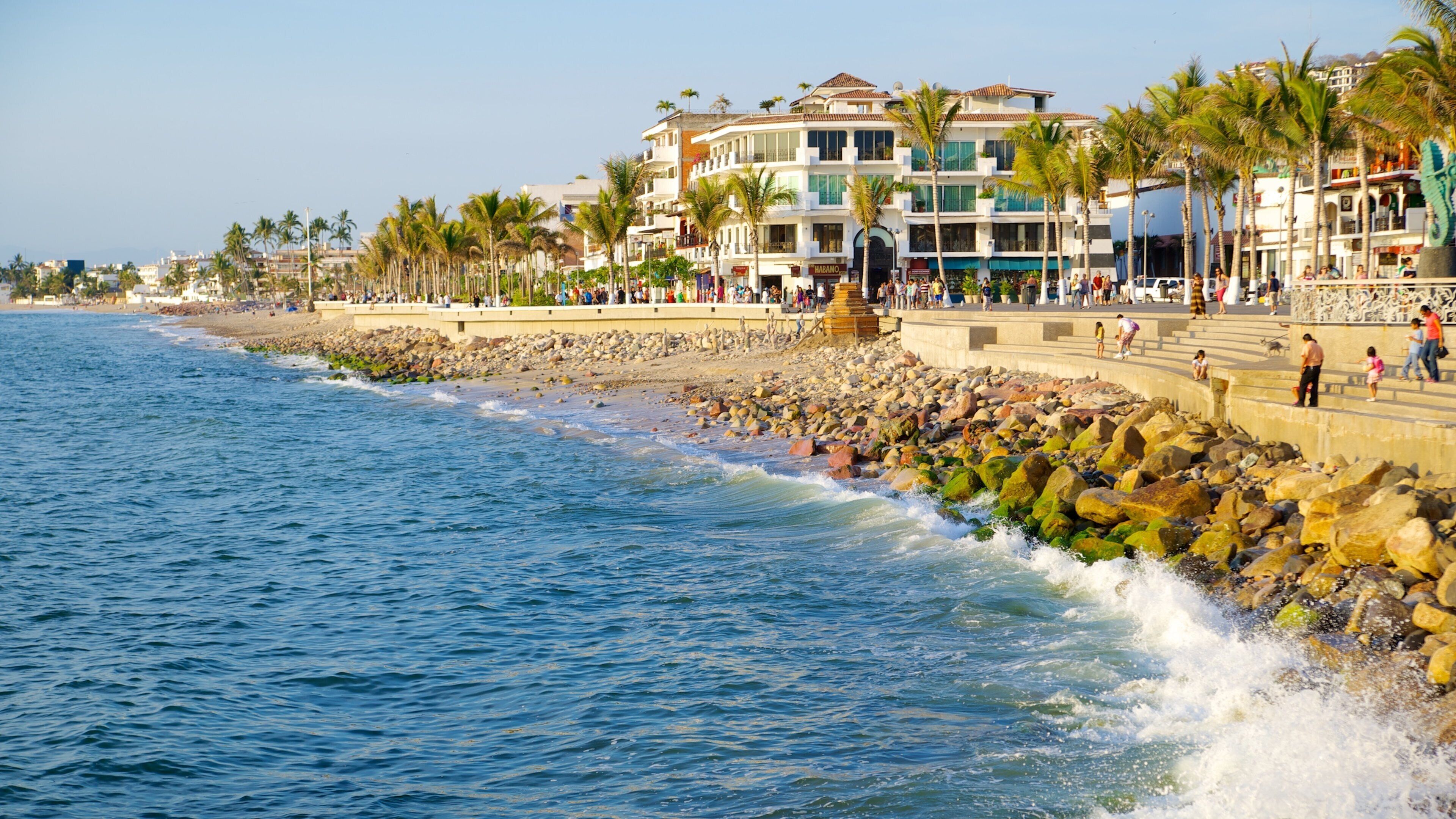Malecon which includes rocky coastline