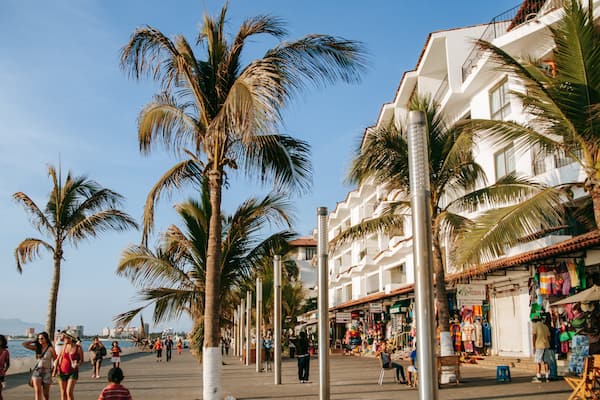 Malecon featuring tropical scenes, a coastal town and street scenes