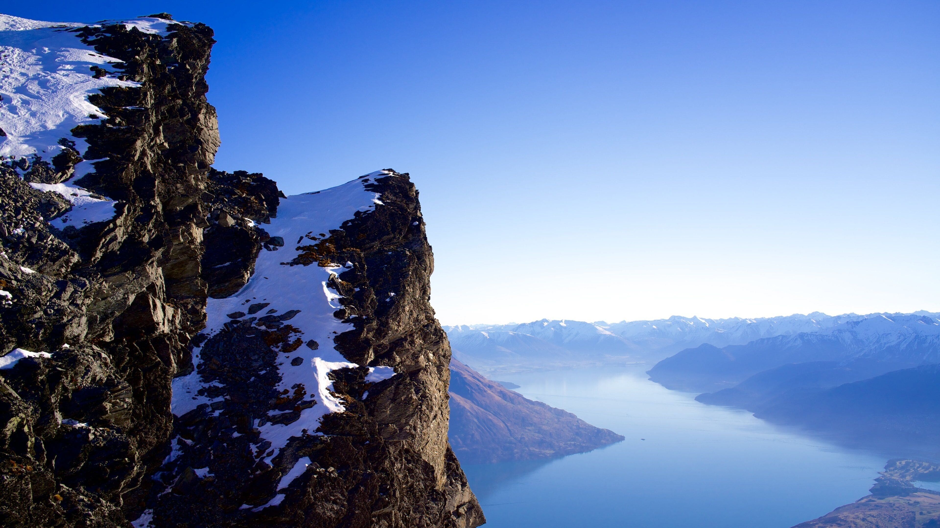 The Remarkables Ski Area showing mountains, a river or creek and landscape views