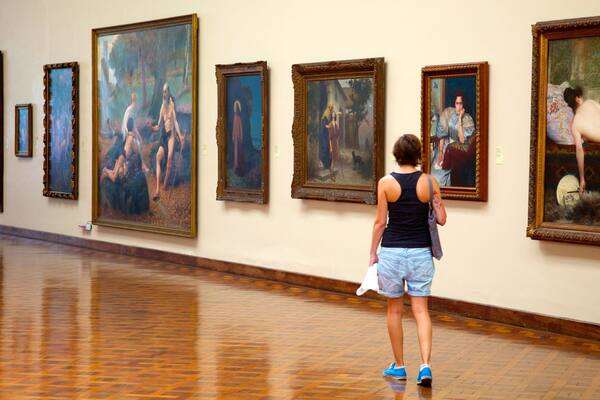 National Fine Arts Museum which includes interior views and art as well as an individual femail