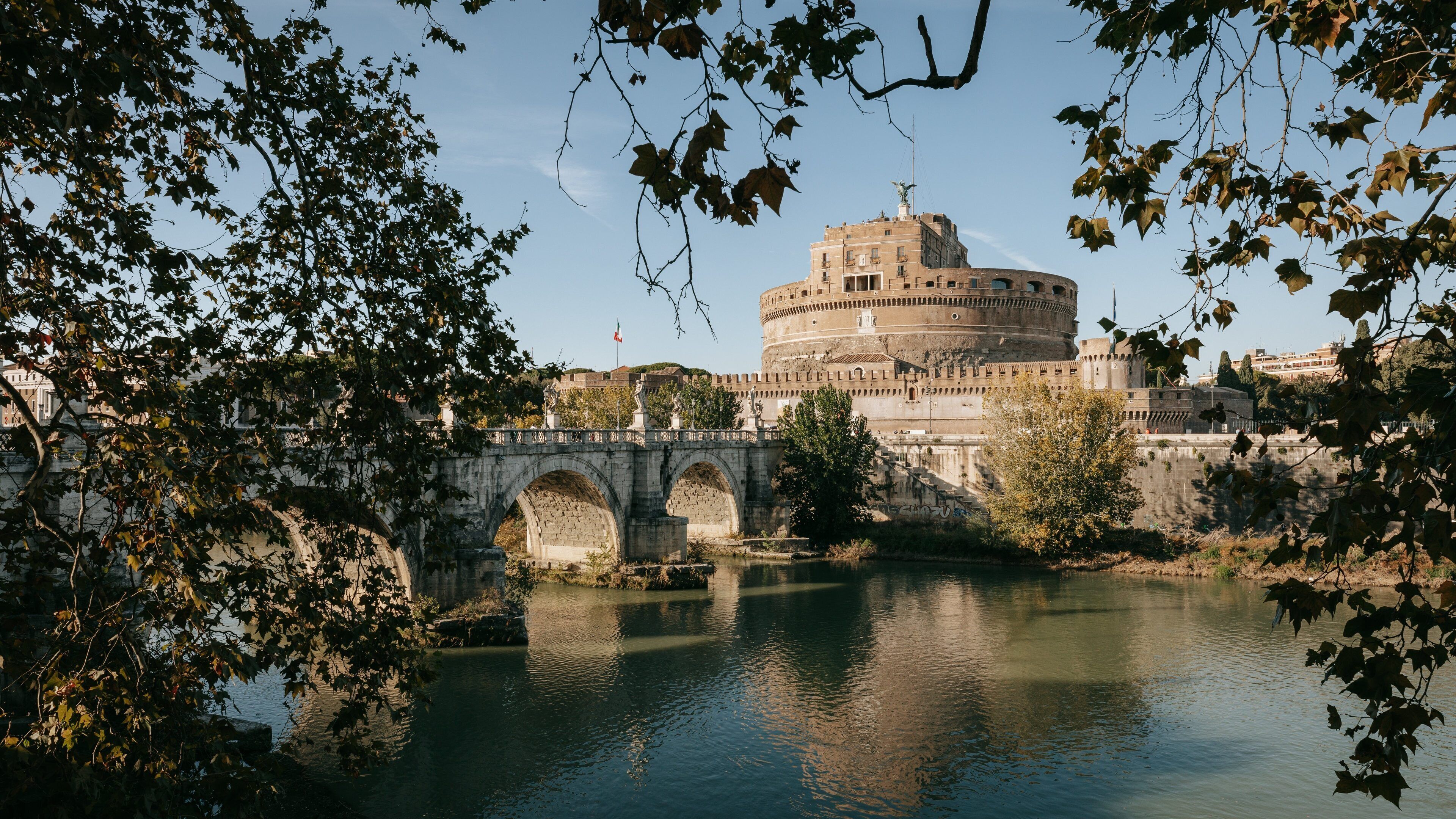 Castel Sant\'Angelo showing a river or creek, heritage architecture and a bridge