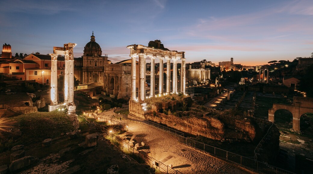 Roman Forum which includes a sunset, night scenes and heritage elements
