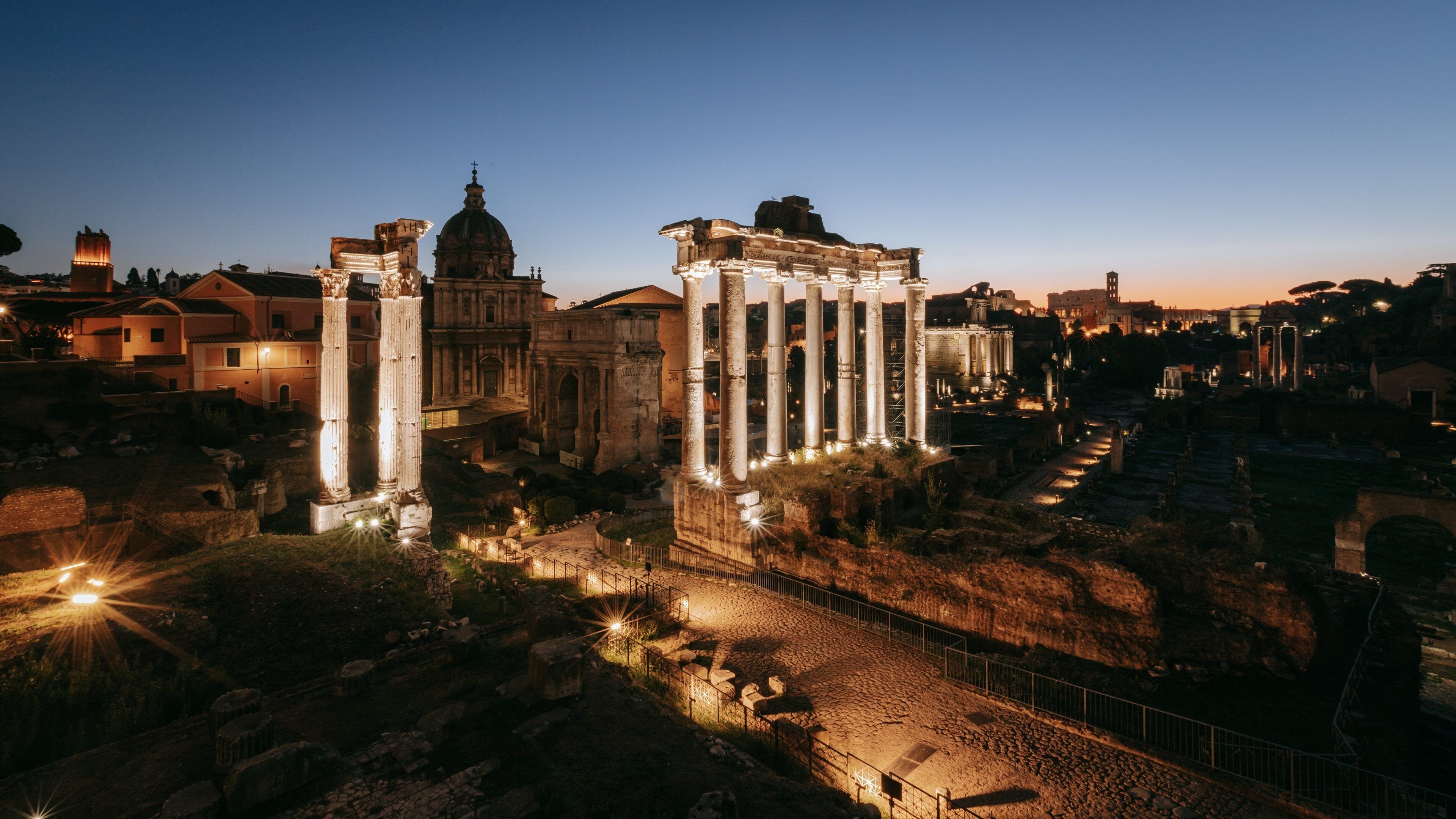 Roman Forum featuring heritage architecture, a monument and night scenes