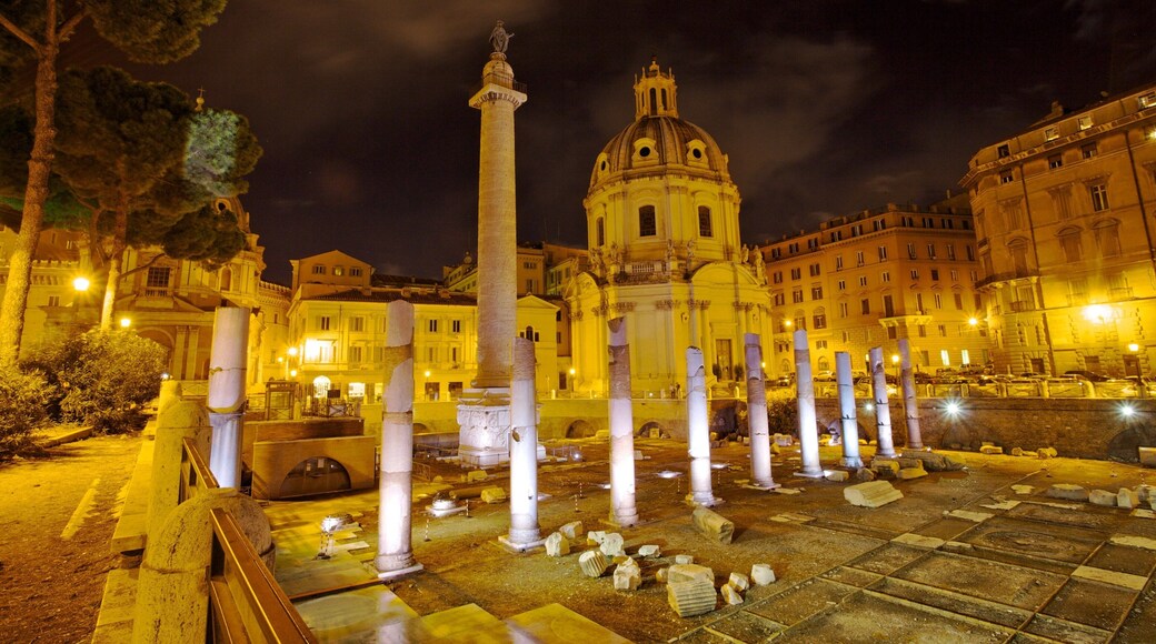 Exploring the illuminated ruins of the Roman Forum at night in Rome, Lazio, Italy