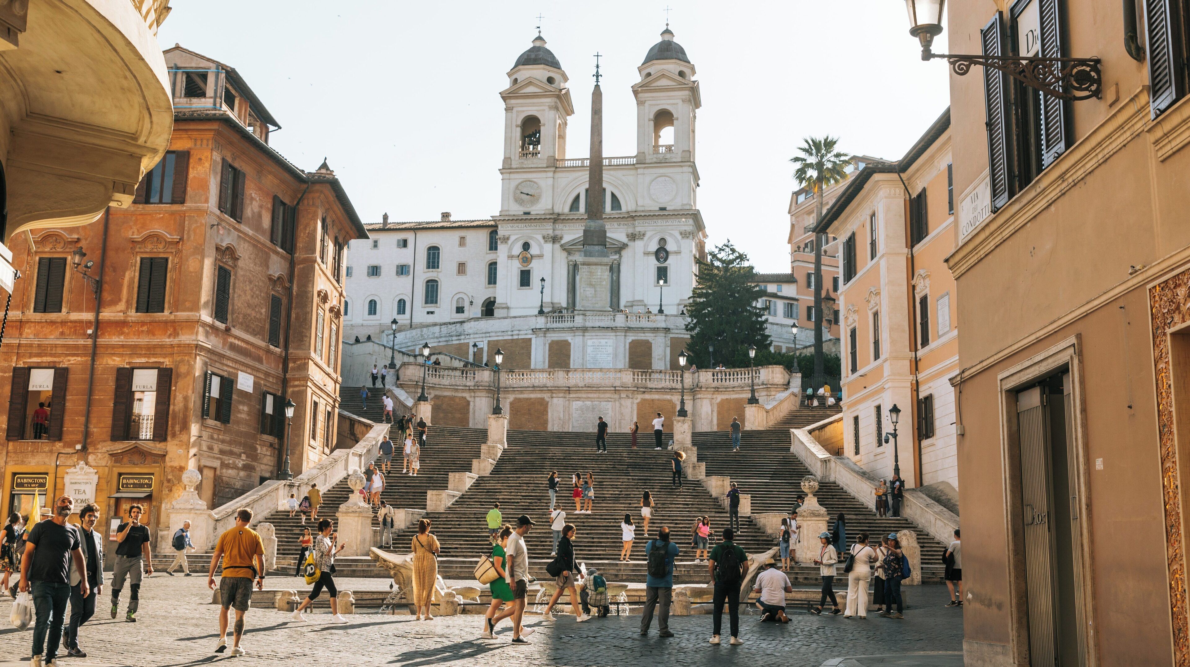 Visit to Piazza di Spagna features historical architecture, bustling activity, and vibrant atmosphere in the heart of Rome's Historic Centre