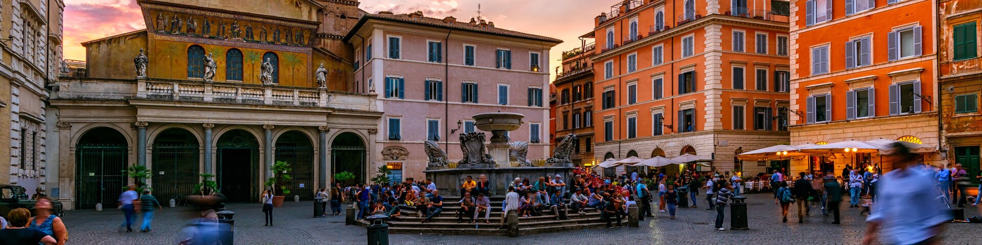 Basilica di Santa Maria in Trastevere and Piazza di Santa Maria in Trastevere at sunset, Rome, Italy. Trastevere is rione of Rome, on west bank of Tiber in Rome. Architecture and landmark of Rome
