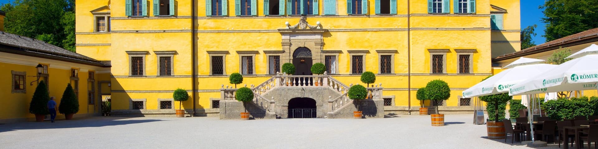 Hellbrunn Palace showing heritage architecture, a square or plaza and chateau or palace