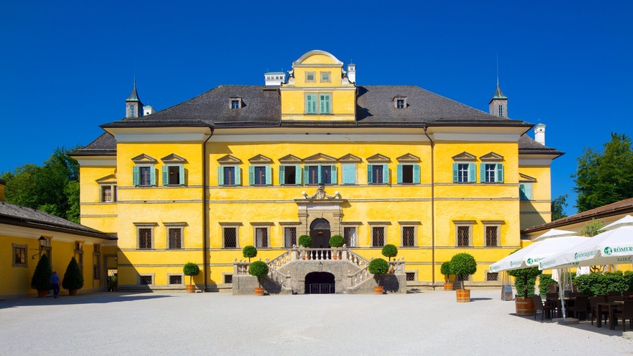 Hellbrunn Palace showing heritage architecture, a square or plaza and chateau or palace