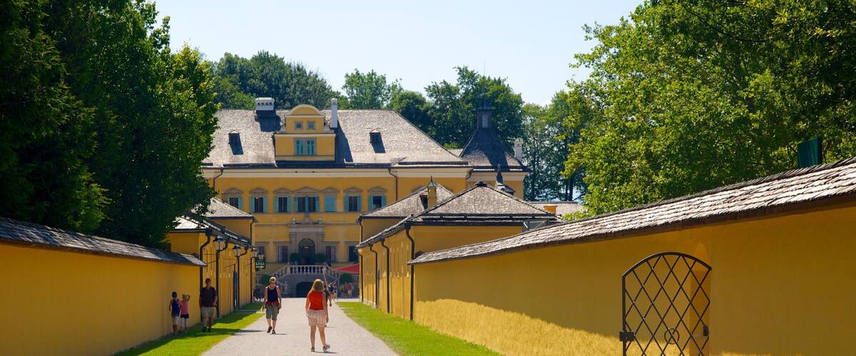 Hellbrunn Palace featuring château or palace, street scenes and heritage architecture