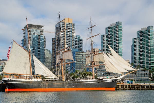 Maritime Museum of San Diego featuring a bay or harbor, heritage elements and a city