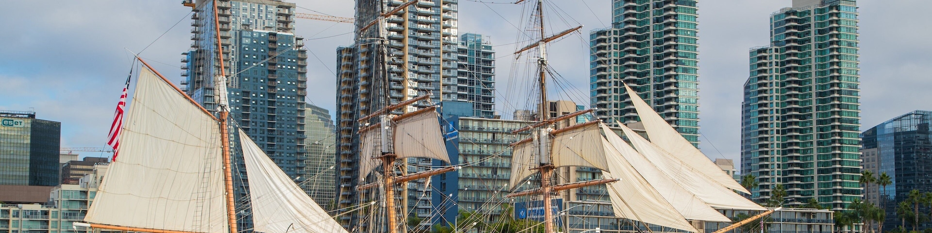 Maritime Museum of San Diego featuring a bay or harbor, heritage elements and a city
