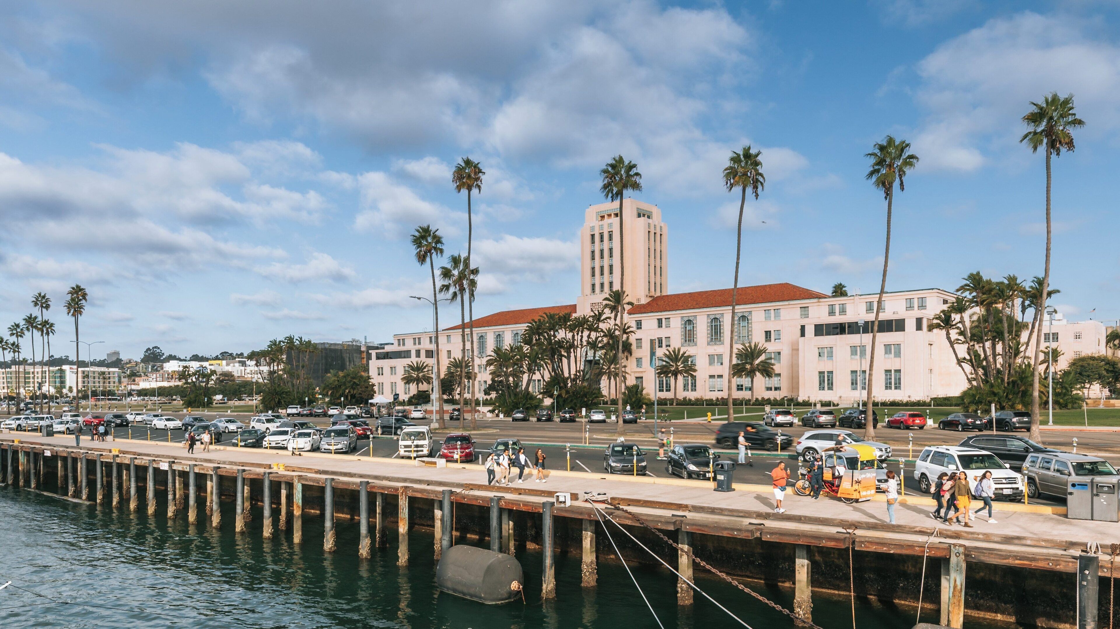 Exploring Maritime Museum of San Diego alongside the scenic waterfront in downtown San Diego, California during a sunny day