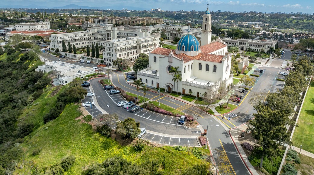 University of San Diego in Alcalá Park sits atop the edge of a mesa overlooking Mission Bay provides stunning views, Blue dome immaculata church near the school of business and student center
