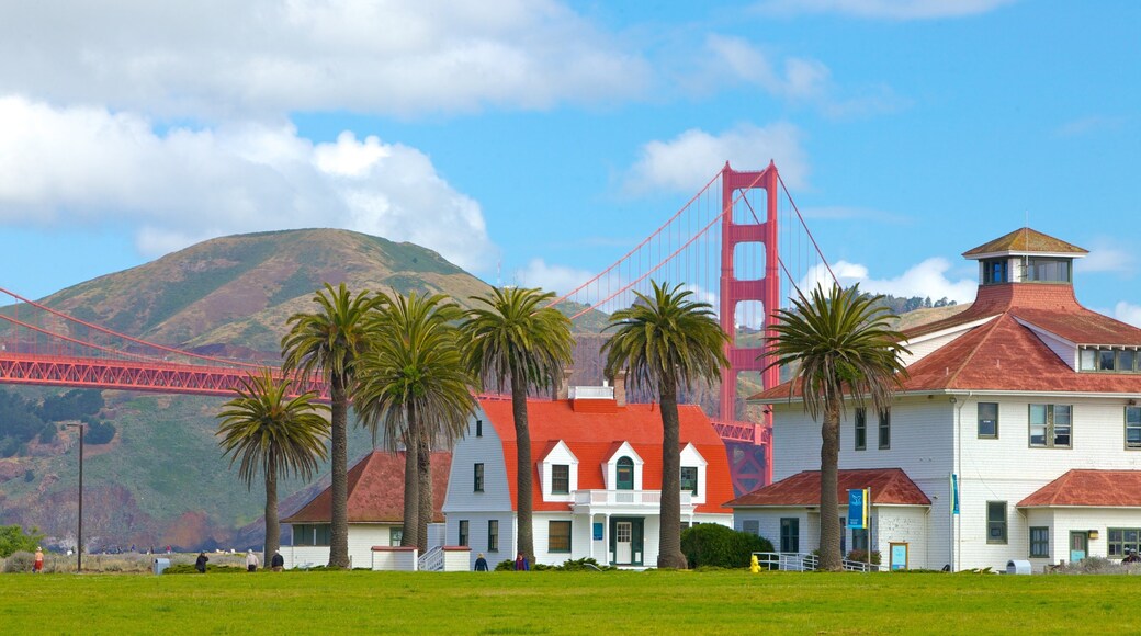 Bridges and palm trees at Presidio of San Francisco with Golden Gate in the background