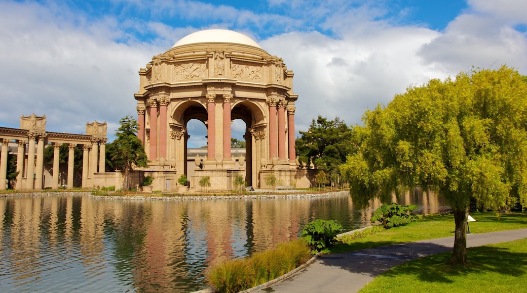 Palace of Fine Arts showing a garden, heritage architecture and a castle