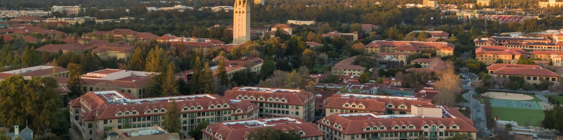 Aerial view of Stanford University campus showcasing the iconic Hoover Tower and surrounding buildings at sunset. Palo Alto, California, USA. 28 December 2024.