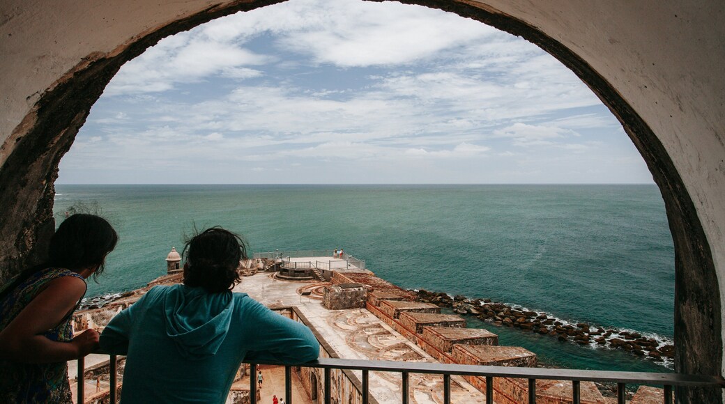 Castillo San Felipe del Morro showing general coastal views and views as well as a couple