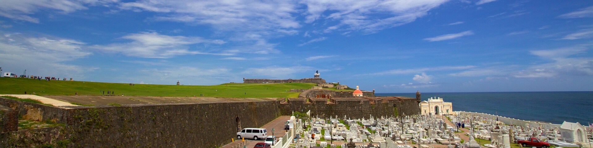 El Morro which includes general coastal views, heritage elements and a cemetery