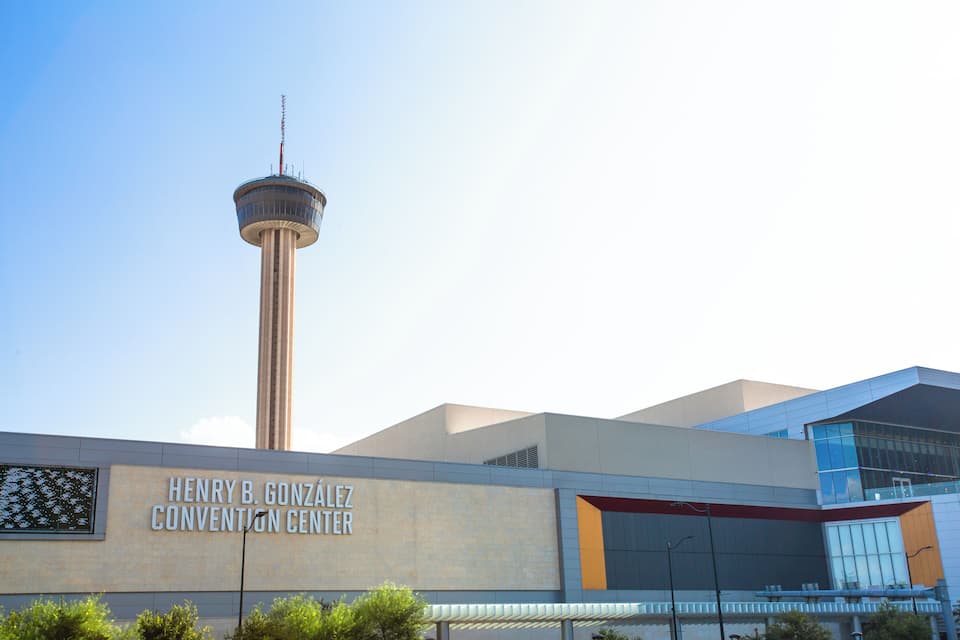 The Henry B. Gonzales Convention Center with a tall tower in the background.
