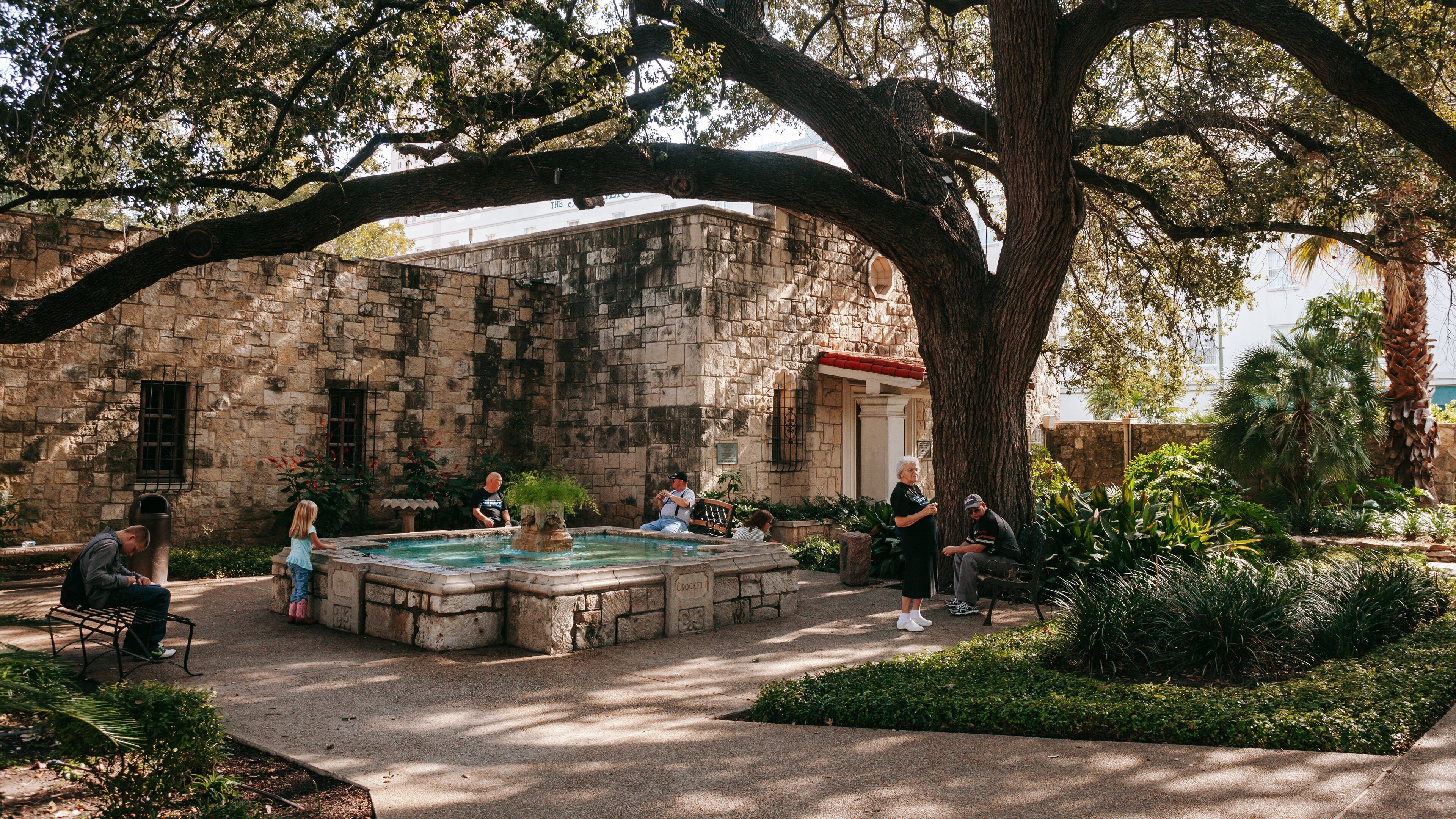 Alamo which includes a pond and a park as well as a family