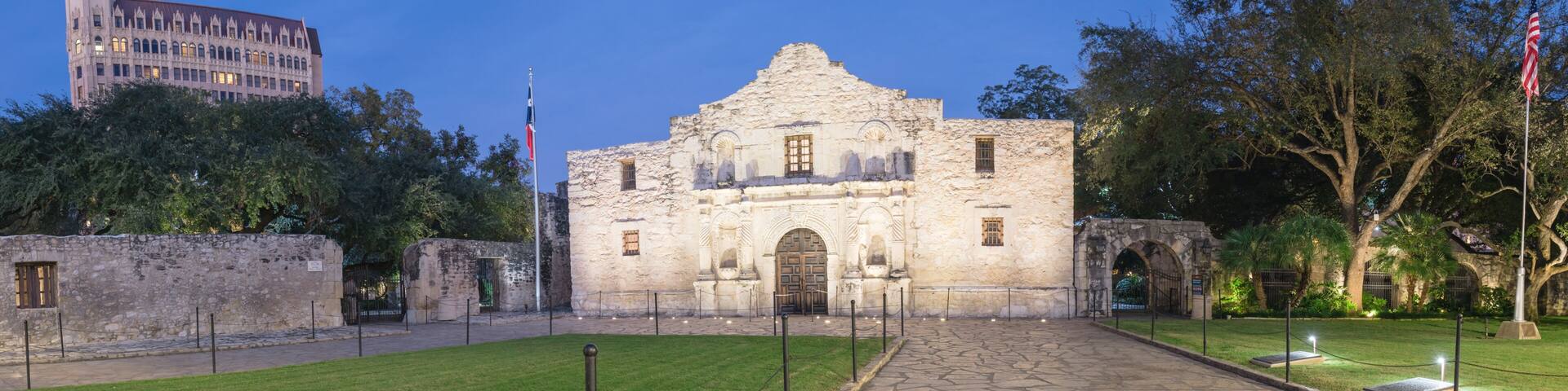 Panorama view the Alamo Mission in San Antonio at blue hour. It is commonly called The Alamo and was known as Misión San Antonio de Valero. A top-rated, rich colonial heritage tourist attraction