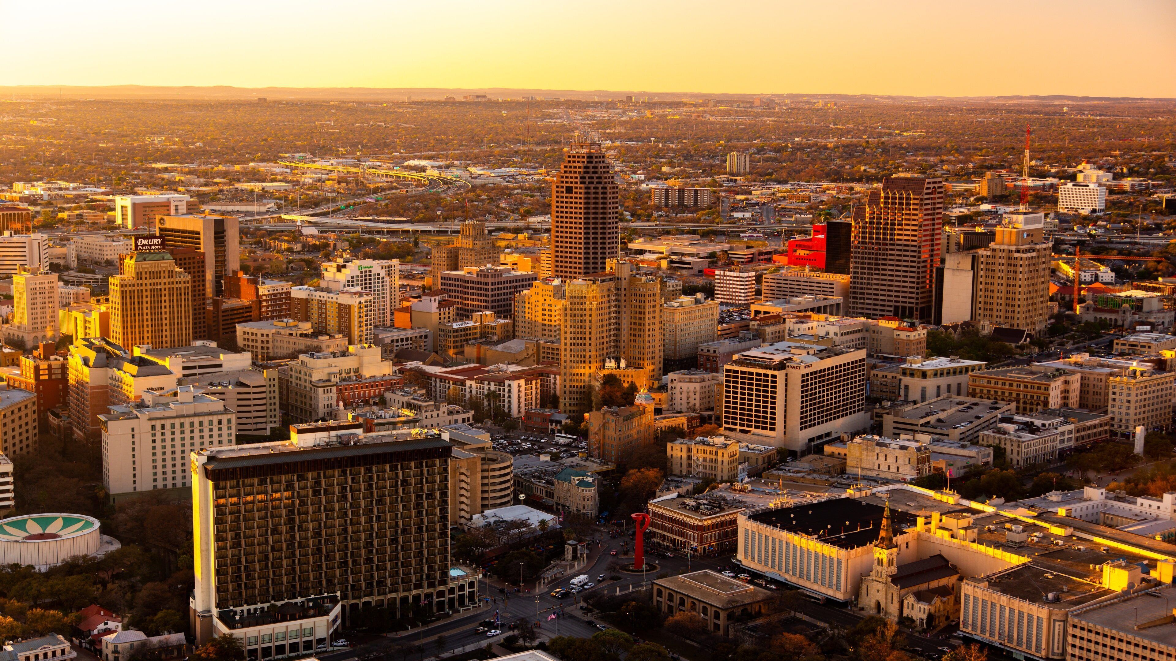 Tower of the Americas featuring landscape views, a sunset and a city
