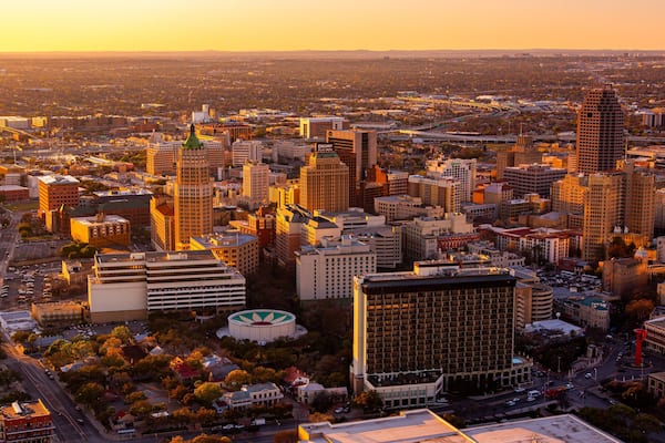 Tower of the Americas featuring landscape views, a sunset and a city