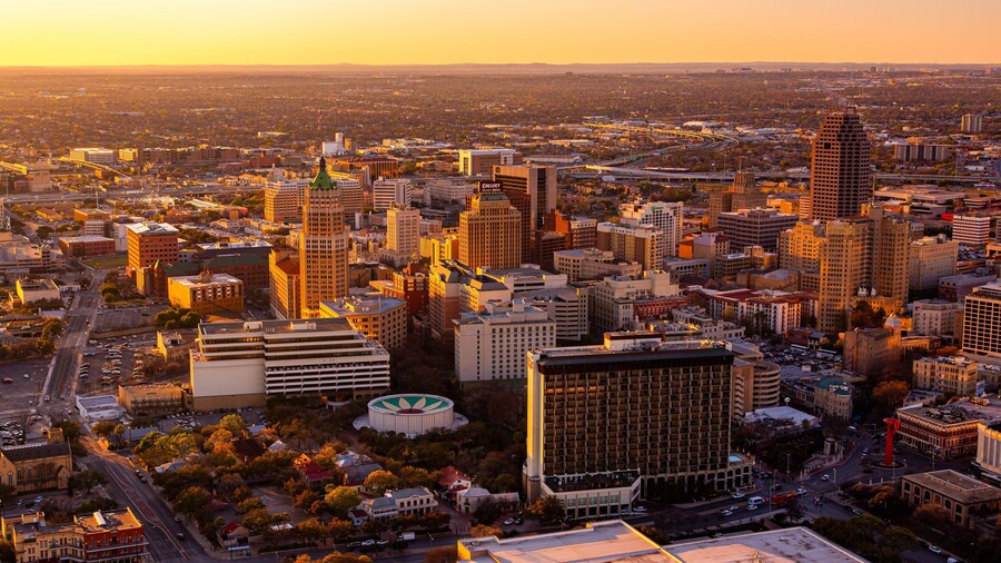 Tower of the Americas featuring landscape views, a sunset and a city