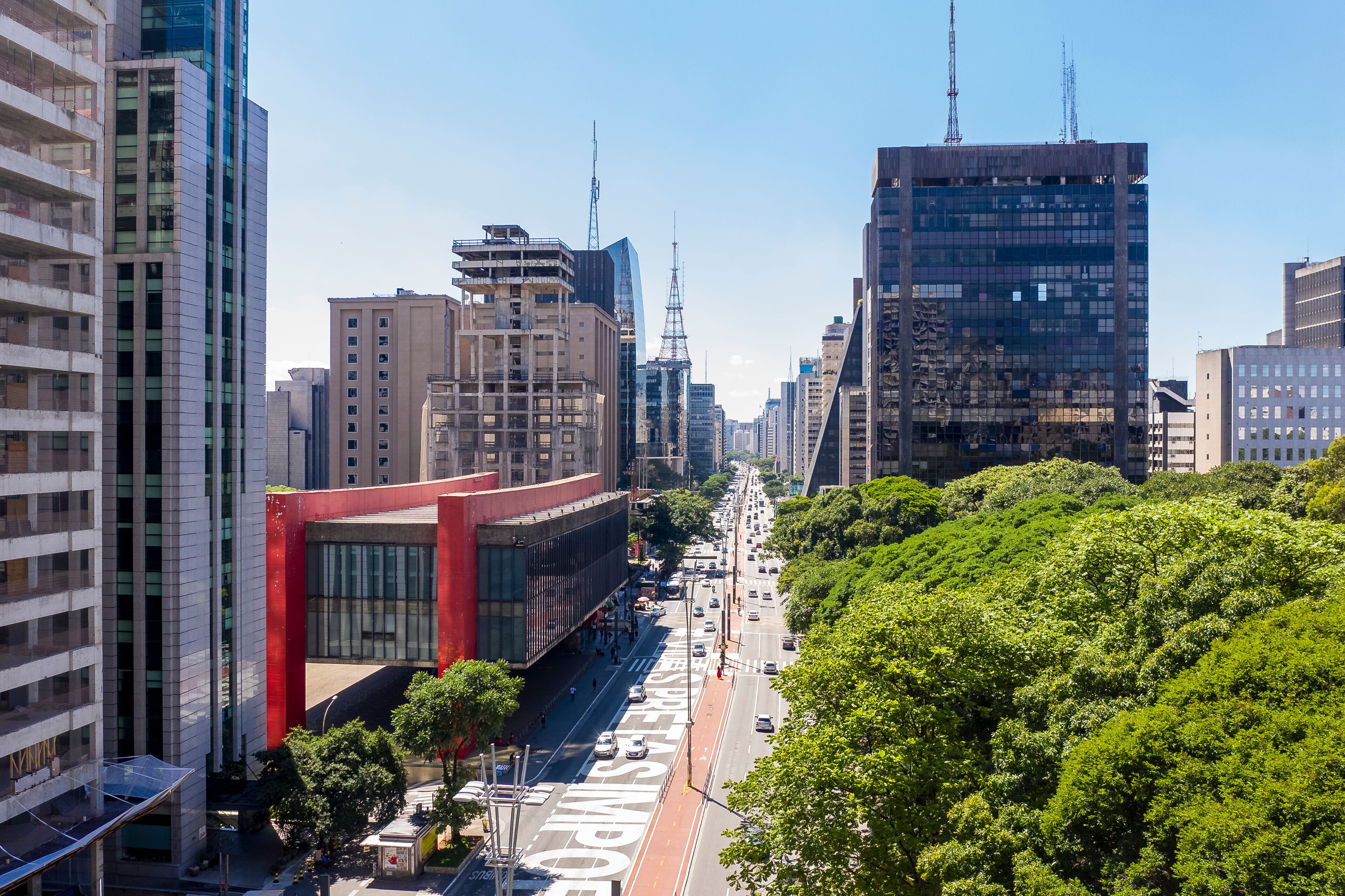 Paulista avenue, financial center of Sao Paulo and Brazil and MASP seen from above with its commercial buildings and intense movement of people and cars, Brazil