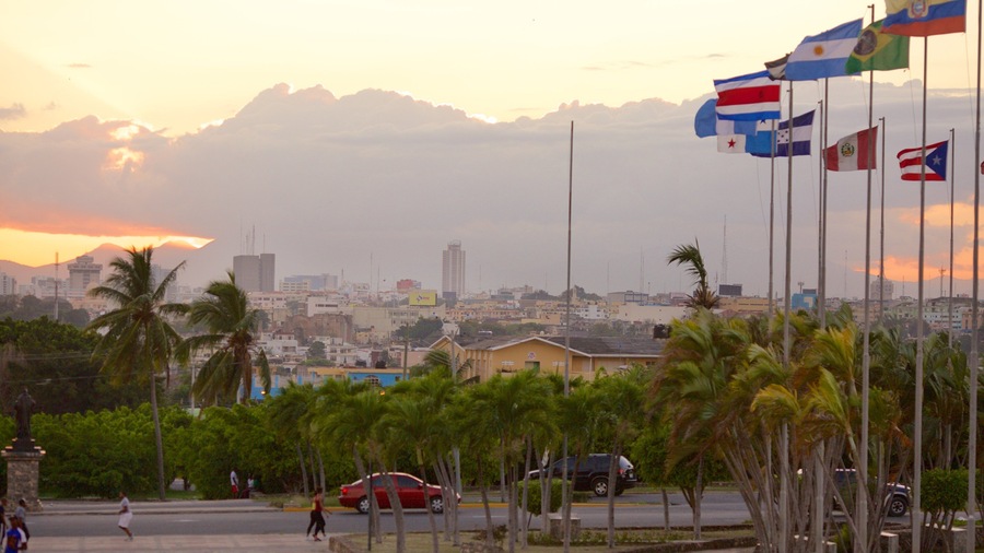 Columbus Lighthouse which includes a sunset and a city
