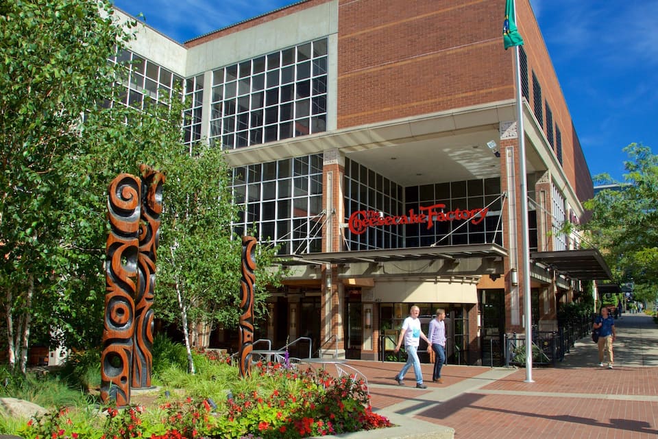 A building with a sign reading "The Cheesecake Factory."